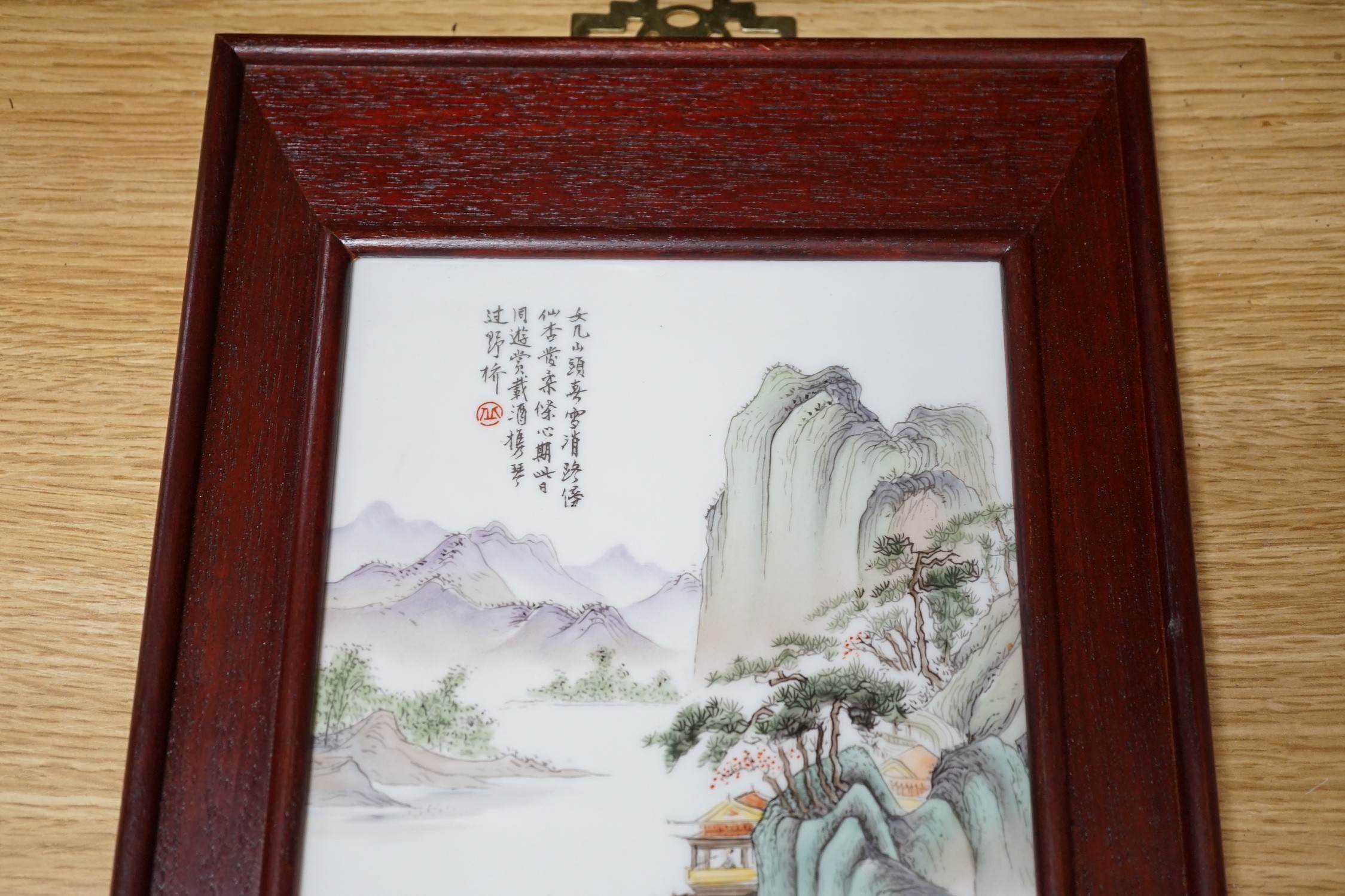 A Chinese framed ceramic plaque, a Chinese cloisonné enamel vase and bowl, plaque 30cms high x 15cms wide